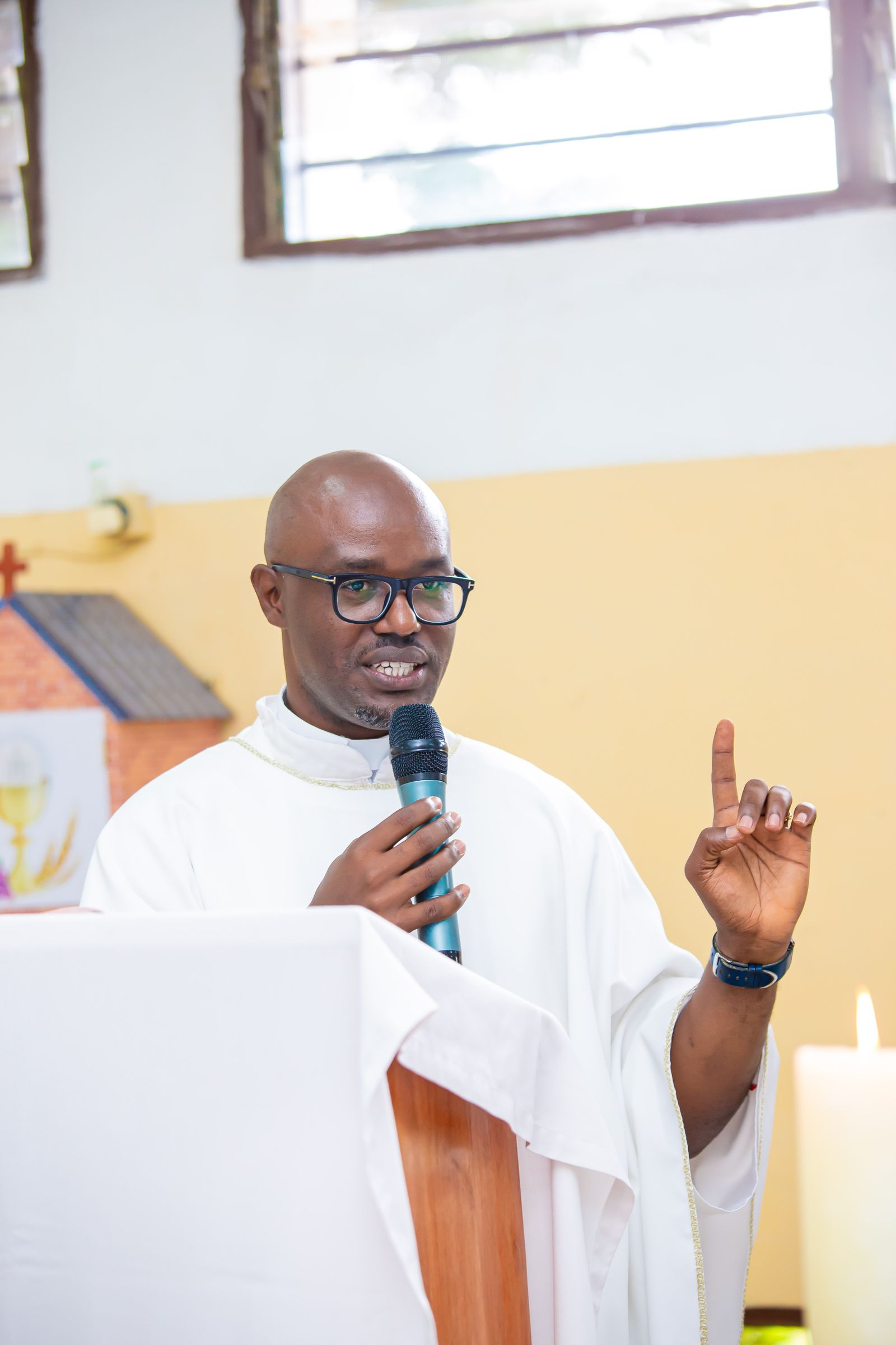 A minister sharing a message with a microphone